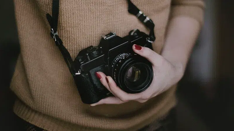 camera strap on neck