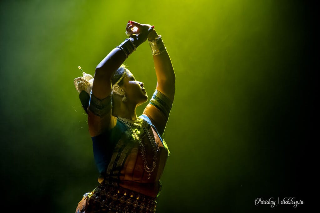 odissi dance moment at minarva theatre hall connection with camera settings for portrait